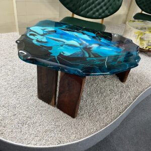 Handmade ocean blue epoxy resin coffee table with irregular live-edge top and solid wood block legs by Reziwood, Udaipur India