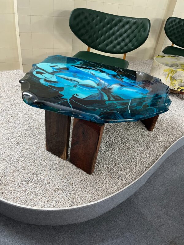 Handmade ocean blue epoxy resin coffee table with irregular live-edge top and solid wood block legs by Reziwood, Udaipur India
